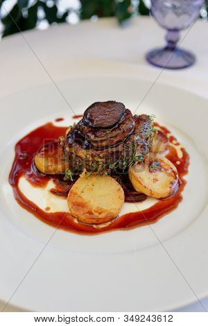 Tournedo beef fillet on restaurant table