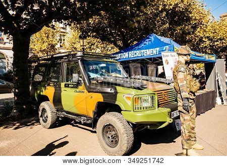 Strasbourg, France - Sep 21, 2019: Solider Mannequin In Military Uniform And Helmet Near Camouflage 