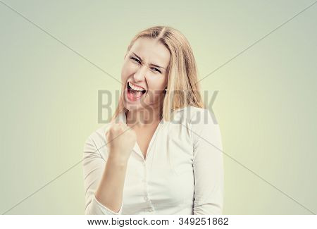 Win. Closeup Portrait Happy Ecstatic Winning Successful Young Woman Fist Hand In The Air Celebrating