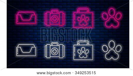 Set Line Pet First Aid Kit, Pet First Aid Kit, Pet Bed And Paw Print. Glowing Neon Icon On Brick Wal