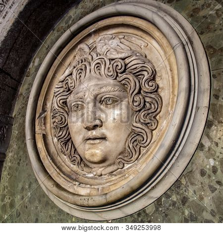 Medusa face sculpture. Head portrait of MedusaIn Greek mythology Medusa was a monster, a Gorgon, a winged human female with a hideous face and living venomous snakes in place of hair