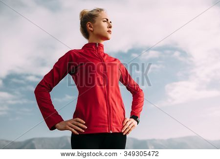 Young Attractive Girl Looks Confidently And Proudly Into The Future. Concept Of Female Success, Moti