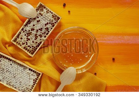 Concept Of Healthy Ecological Food With Wooden Tableware. Bee Products With A Large Number Of Vitami