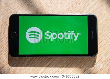 Amsterdam, The Netherlands, 02/06/2020, Iphone 8 Plus Is On The Table, Spotify Start Screen On Smart