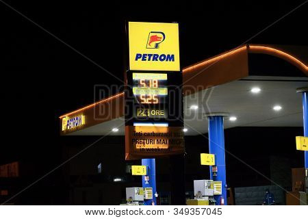 Fuel Station At Night. Omv Petrom Is The Largest Romanian Oil And Gas Company. Prices Displayed.  Ro