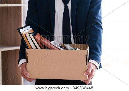 Businessmen Are Holding Resignation Document And Packing Personal Company On Brown Cardboard Box Cha