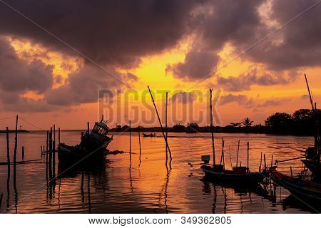 The Beauty Of An Old Fishing Boat Moored Up In The Morning Sunlight.