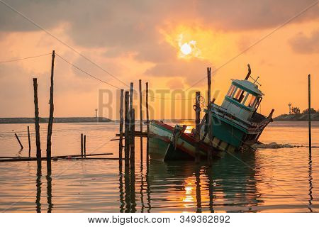 The Beauty Of An Old Fishing Boat Moored Up In The Morning Sunlight.