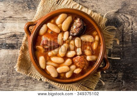 Typical Spanish Fabada Asturiana On Wooden Table. Top View