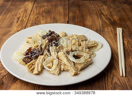 Spicy Chinese Or Korean Yuba Tofu Bamboo And Oyster Mushrooms On Wooden Background.