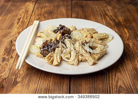 Spicy Chinese Or Korean Yuba Tofu Bamboo And Oyster Mushrooms On Wooden Background.