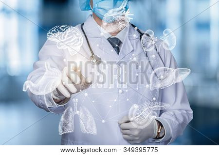 Concept Magnetic Resonance Imaging All Organs.the Doctor Clicks On The Mri On Blurred Background.