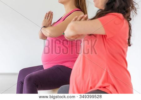 Pregnant Women Are Doing Yoga And Maditing In Yoga Class, Healthy Prenatal Lifestyle
