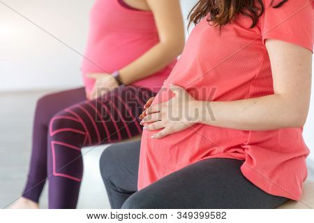Pregnant Women Are Doing Yoga And Maditing In Yoga Class, Healthy Prenatal Lifestyle