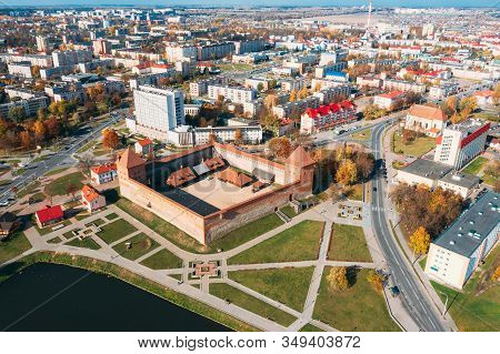 Lida, Belarus. Aerial Birds-eye View Of Cityscape Skyline. Lida Castle In Sunny Autumn Day. Famous P