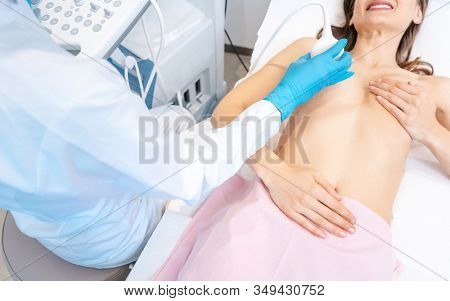Preemptive ultrasound mammography done by gynecologist on modern machine