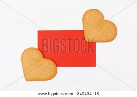 Red Mockup Greenting Card With Two Heart Shape Cookies On A White Backround. Simbol Of Cozy Love And