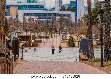 Daejeon, South Korea; January 28, 2020: Two Unidentified Young Women Standing In Plaza At Yurim Publ