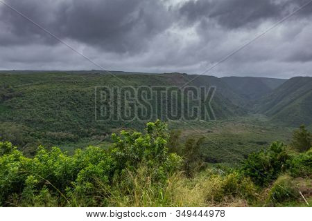 Kohala, Hawaii, Usa. - January 15, 2020: Green Pololu Valley From Start To End Under Dark Rainy Clou