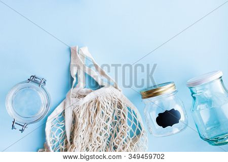 Reusable Cotton Bag And Glass Jars On A Blue Background. Zero Waste Shopping. Sustainable Living, Pl