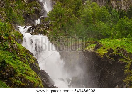 Norwegian Landscape. Waterfall Latefoss Latefossen, Odda Hordaland County In Norway. National Touris