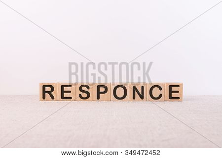 Responce Word Concept Written On Wooden Cubes On A Light Table And A Light Background
