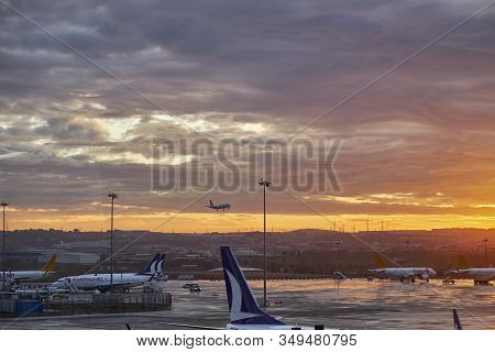 Istanbul Sabiha Gokcen Airport - January 2020. Aircraft Is Landing Opposite Rising Sun