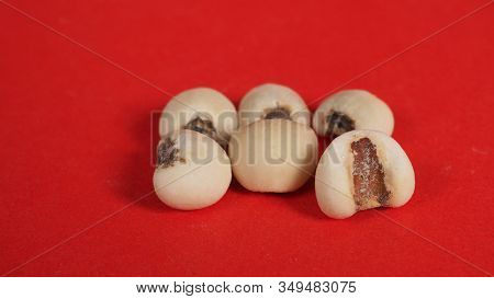Job's Tears, Also Known As Adlay And Coix On Red Background. Popular In Asian Cultures As A Food Sou