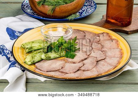 Cooked Veal Tongue With Fresh Vegetables. Shot In The Decor