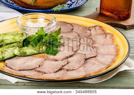 Cooked Veal Tongue With Fresh Vegetables. Shot In The Decor