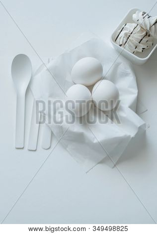 Protein Breakfast, Eggs And Merinques On White Kitchen Table