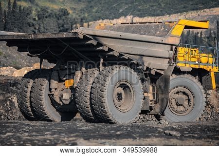Big Yellow Mining Truck Empty Body For Anthracite. Open Pit Mine, Extractive Industry For Coal