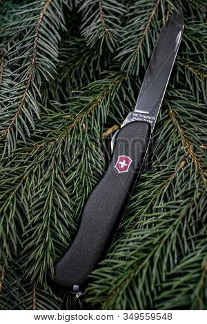 Ibach, Switzerland 02.02.2020 - Black Victorinox Swiss Army Knife Multitool Opened