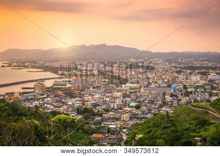 Nago, Okinawa, Japan downtown skyline at sunset.