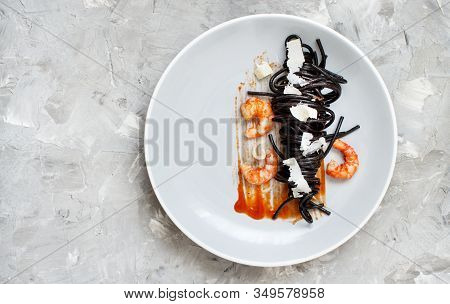 Squid Ink Black Spaghetti With Prawns And Tomatoes Top View