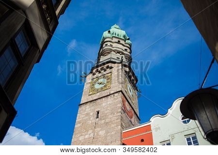 Insbruk, Austria - February 2020:pedestrians, Residents And Tourists In The Narrow Streets Of The Ol