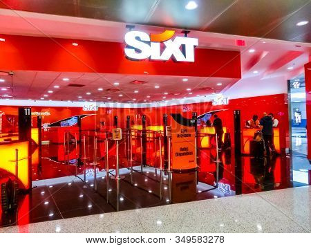 Miami, Florida, Usa - November 29, 2019: The People Near Sixt Rental Car Office At Miami Airport At 