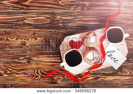 Romantic Breakfast For Valentine's Day. Two Cups Of Coffee, Two Cupcakes In The Form Of A Heart On A