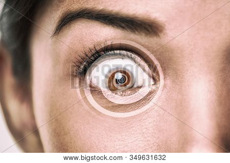 Hypnosis treatment - eye with overlay of spiral for hypnose concept.