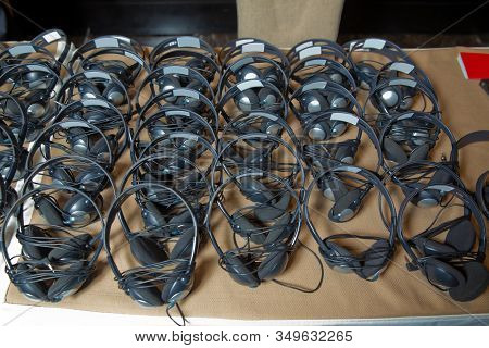 A Set Of Headphones For Simultaneous Translation During Negotiations In Foreign Languages. Headphone