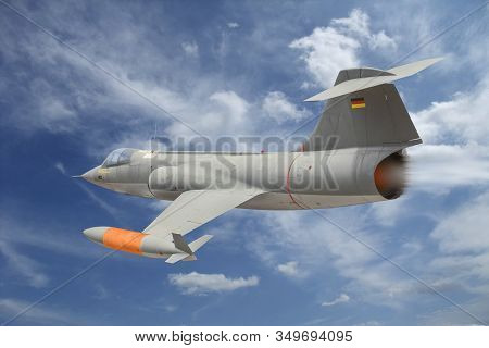 A Starfighter F-104 In Front Of Slightly Clouded Sky