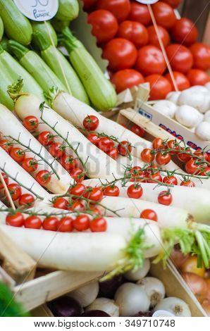 Various Fruits And Vegetables For Sale At Market Stal