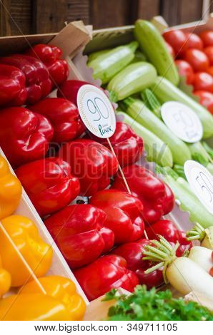 Various Fruits And Vegetables For Sale At Market Stal