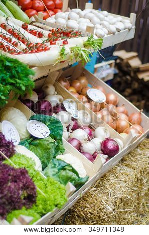 Various Fruits And Vegetables For Sale At Market Stal