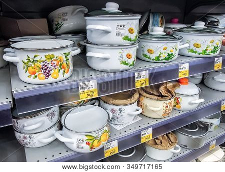 Samara, Russia - September 26, 2019: Different Metal Enamelware, Cooking Pots Containers Utensils Fo