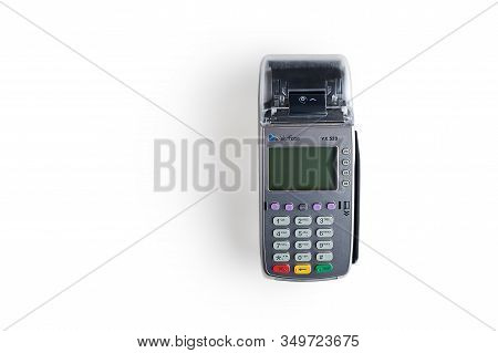 Moscow, Russia - January 5, 2020, Wireless Credit Card Payment Pos Terminal Verifone Vx 520 On A Whi