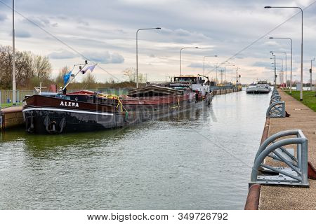 Maasbracht, The Netherlands - March 20, 2019: Big Barge In Lock Of Canal Julianakanaal Near River Me