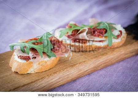 Bruschetta With Tomato And Basil, Bruscetta With Salmon And Eggs, Bruscetta With Prosceutto And Ruco