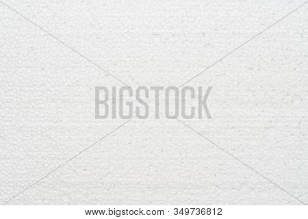 White Abstract Polystyrene Foam Texture Background. Close-up Detail View Of Styrofoam, Plastic Sheet