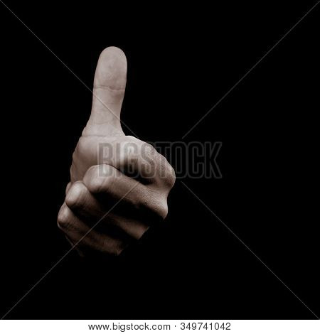 Everything Is Going To Be Ok - Human Hand On Black Background Showing Symbol Ok